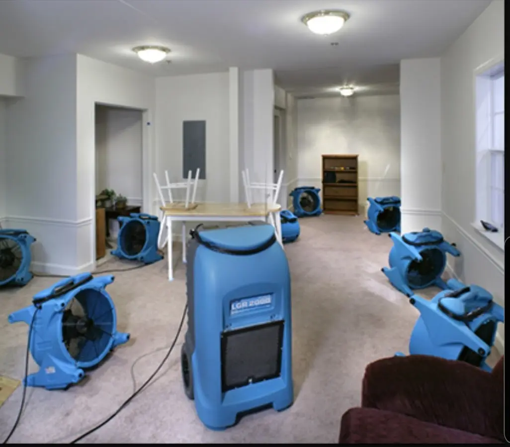 Air movers and dehumidifier setup for Water Extraction & Removal in Granville